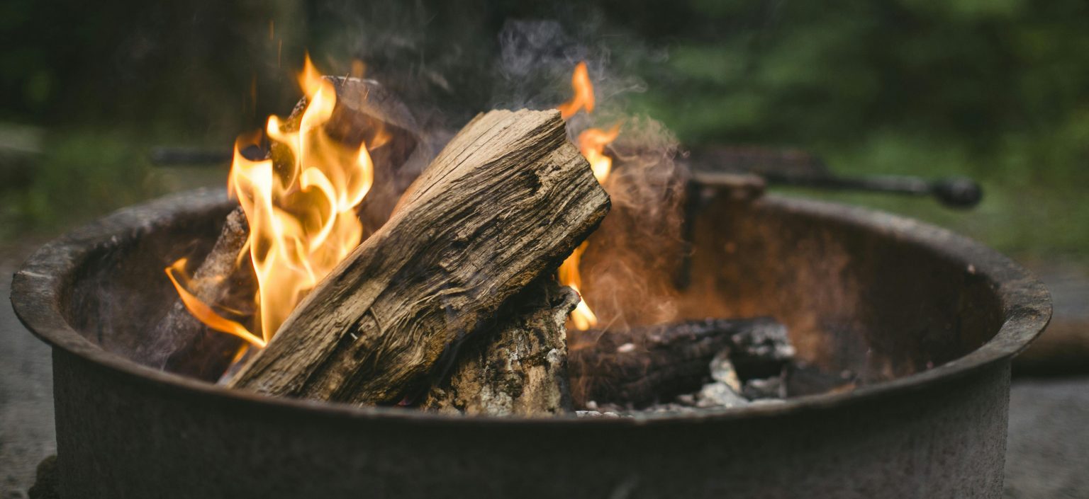 a campfire in a fire pit